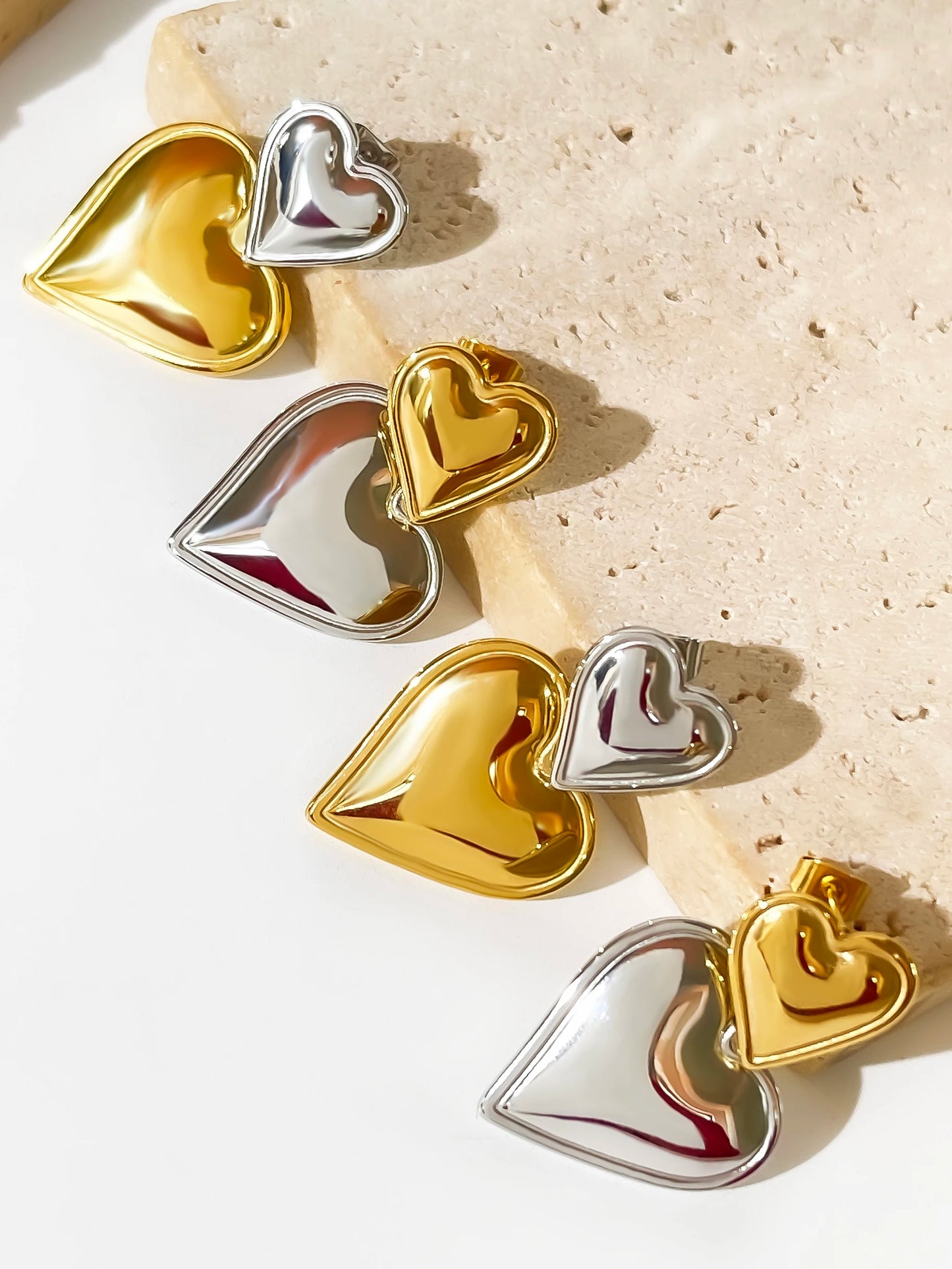 DARYAN Tie & Heart Drop Earrings